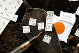 OURS Perforated Letterpress Label Book / Letters (Framed)